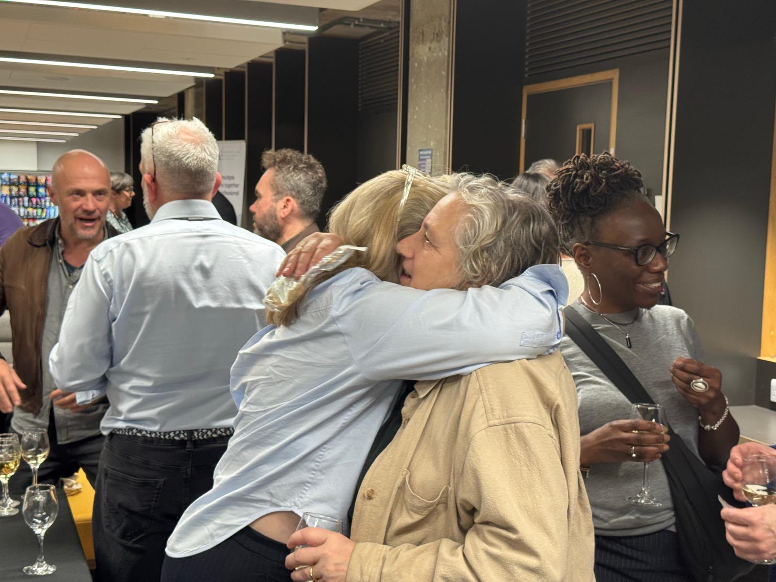 Acupuncturists networking at a professional conference